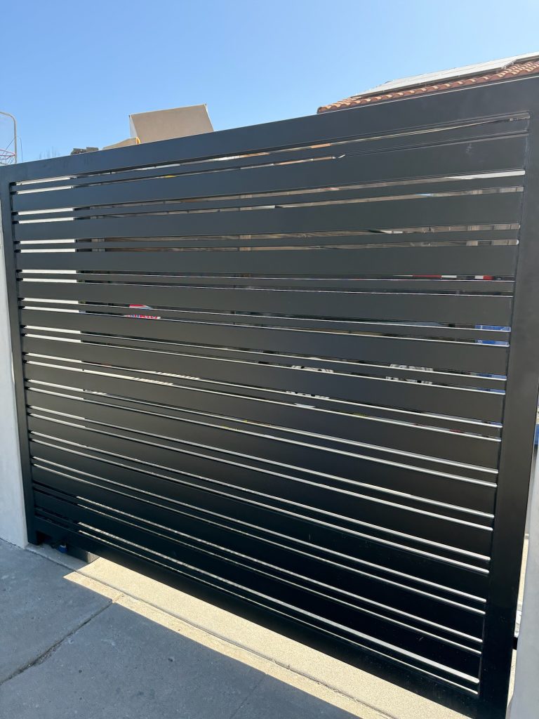 Modern horizontal bar fence installed in Los Angeles