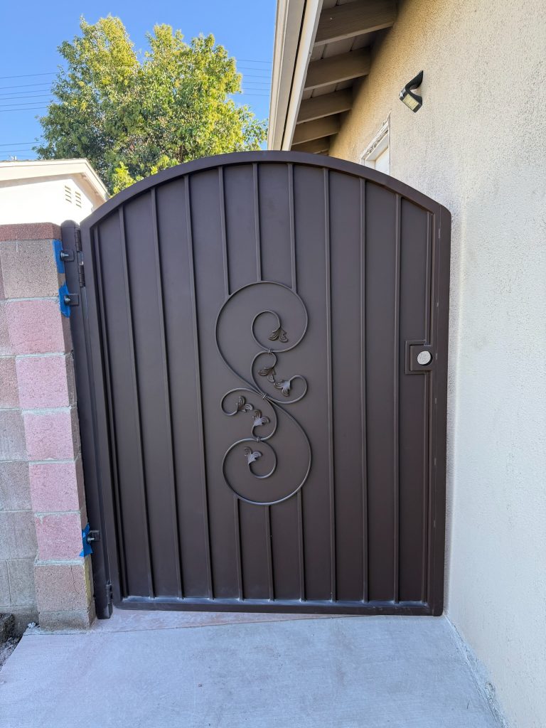 Sheet metal pedestrian gate with custom cutout design