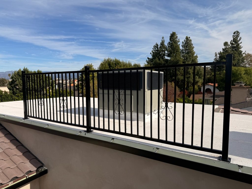 Modern metal railing with floral panel design