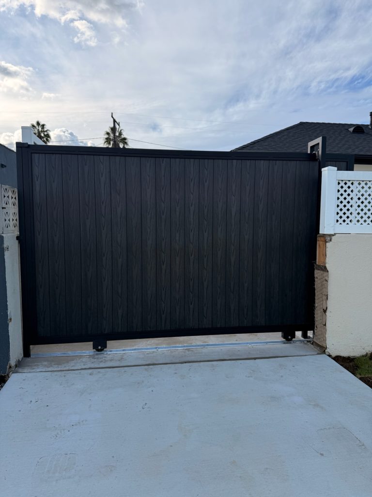 Composite sliding driveway gate