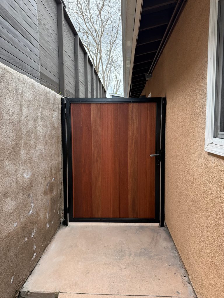 Wood pedestrian gate with aluminum frame